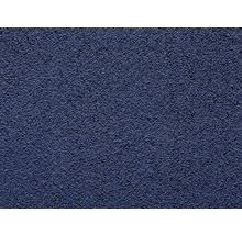 Detailní záběr stěny s omítkovou strukturou