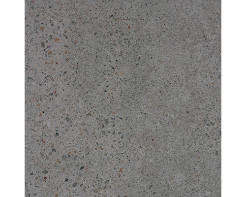 Detail betonové dlaždice se skvrnitým povrchem