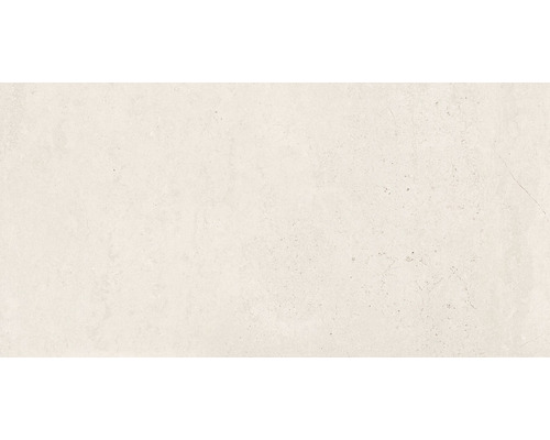 Světlá keramická dlaždice s matným povrchem