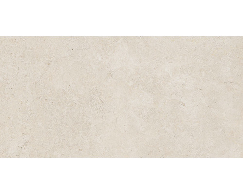 Detail světlé dlaždice z přírodního kamene