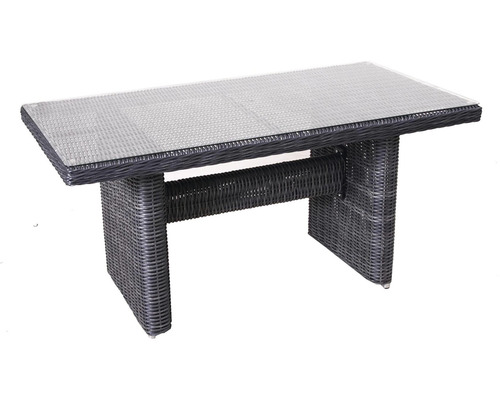 Zahradní stůl se skleněnou deskou a vzhledem ratanu