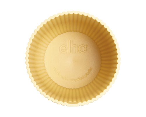 Žlutý kulatý květináč z recyklovaného plastu, pohled shora