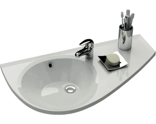 Na obrázku je umyvadlo s baterií, mýdlem a držákem na zubní kartáčky.