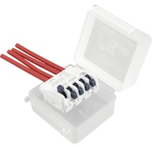 Elektrická připojovací svorka s červenou kabeláží v průhledné krabici