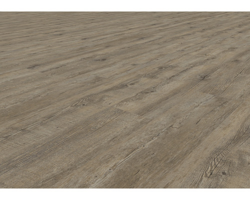 Položená laminátová podlaha se vzhledem dřeva.