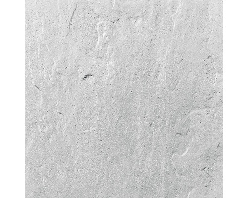 Detail světlého betonového povrchu s hrubou texturou.