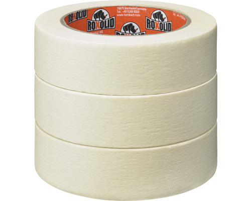 Tři role malířské krepové pásky naskládané na sobě