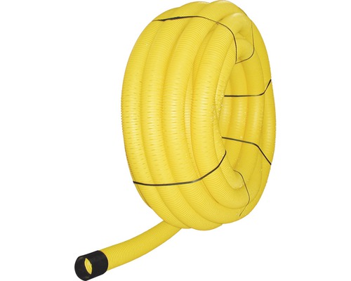 Žlutá drenážní hadice stočená