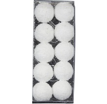 Dekorativní sněhové koule v průhledném balení.