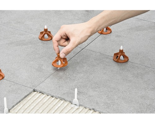 Pokládka dlaždic s nivelačním systémem