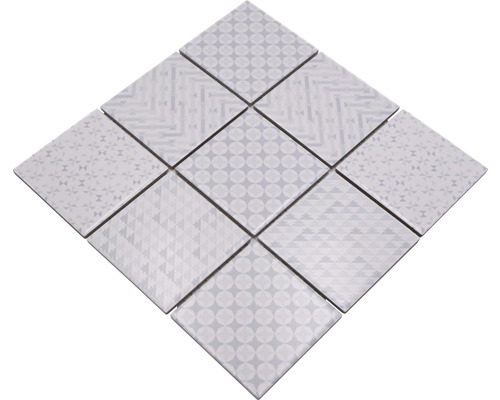 Vzor z devíti čtvercových dlaždic s různými geometrickými vzory