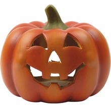 Halloweenská dýně s vyřezávaným obličejem k dekoraci