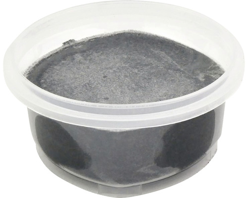 Uhlíkový prach v průhledné dóze