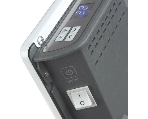 Detailní pohled na topné zařízení s digitálním displejem a ovládacími prvky