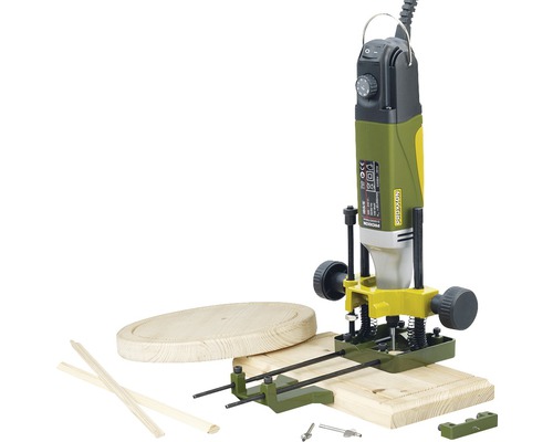 Horní frézka Proxxon s příslušenstvím na dřevěném podkladu