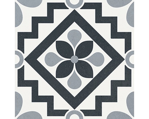 Dekorativní podlahová dlaždice s květinovým vzorem a geometrickými prvky