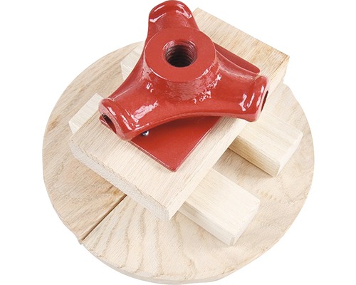 Nástavec na štípačku dřeva na dřevěném podkladu