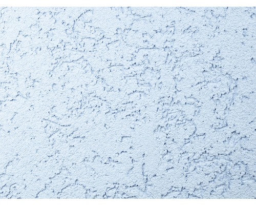 Detail omítkové fasády se škrábanou omítkovou strukturou