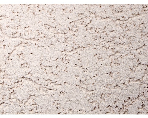 Detail stěny s texturou škrábané omítky