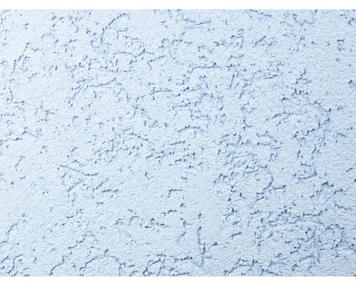 Detail stěny s hrubou omítkou