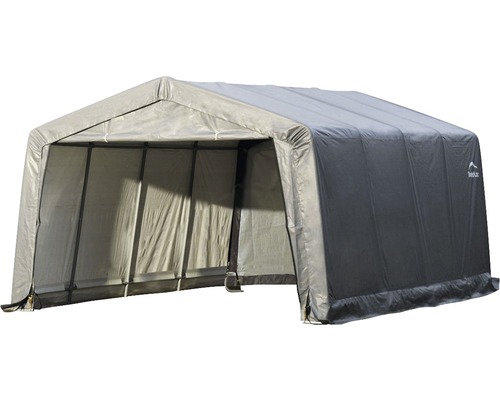 Šedá skladovací hala se stanem