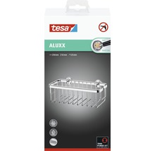 Sprchová polička Tesa Aluxx v krabici o rozměrech 250 x 92 x 125 milimetrů. Produkt je nerezový a vyrobený z hliníku.