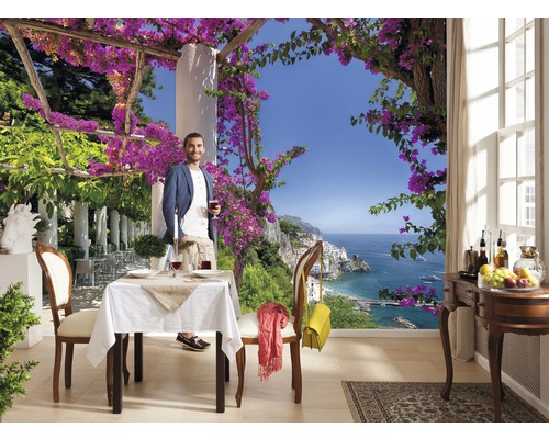 Fototapeta s mužem na terase s výhledem na moře