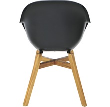 Pohled zezadu na černou židli s dřevěnýma nohama.