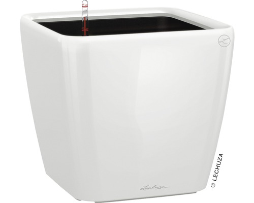 Bílý květináč se zavlažovacím systémem