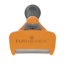 FURminator nástroj pro péči o srst domácích mazlíčků s tlačítkem FURejector