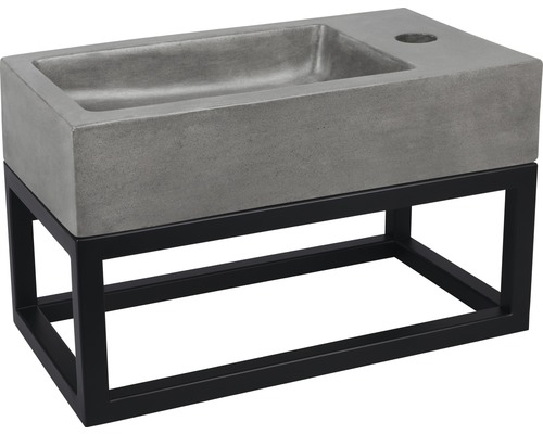 Umyvadlo z betonu s černým kovovým rámem