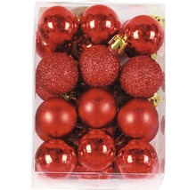 Balení červených vánočních koulí v různých provedeních