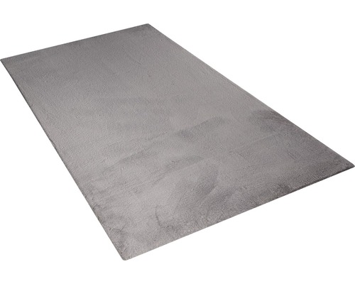 Obdélníkový koberec ze syntetického materiálu