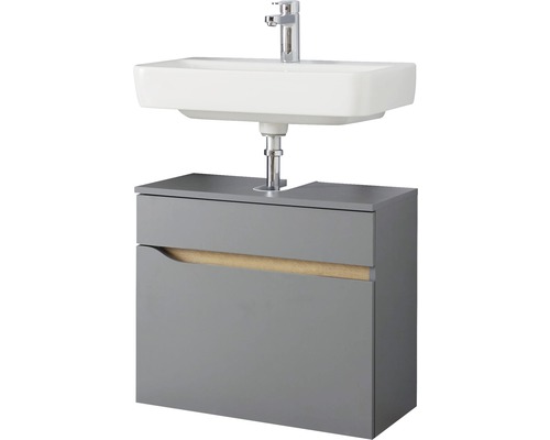 Umyvadlo se skříňkou ve skříňce v koupelně