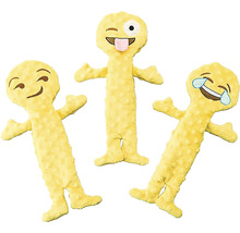 Tři žluté plyšové hračky emoji s různými výrazy obličeje