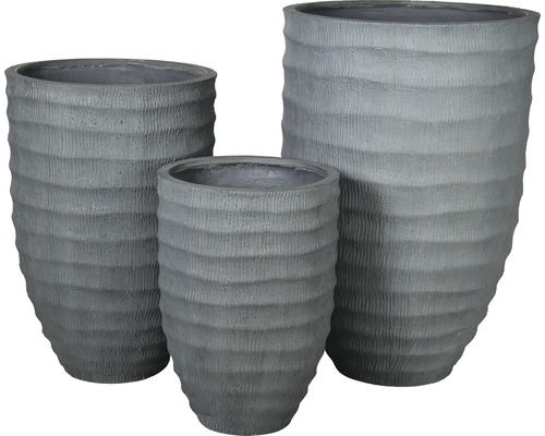 Tři šedé květináče s vlnitým vzorem