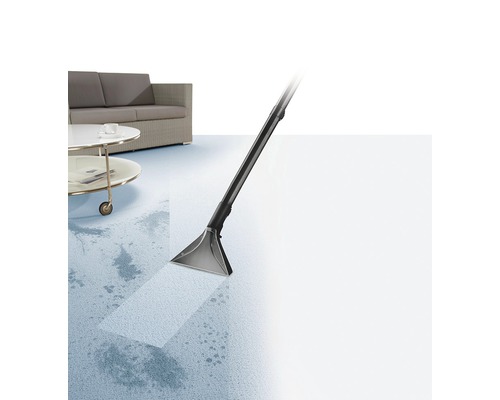 Čistič koberců v provozu pro odstranění skvrn na koberci