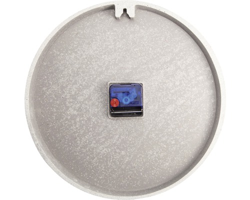 Zadní strana kulatých nástěnných hodin s hodinovým strojkem