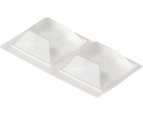 Dva plastové kryty na otvory pro šrouby