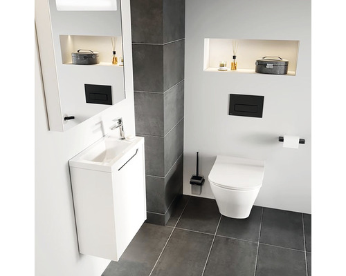 Moderní koupelna s bílým umyvadlem, toaletou a šedou dlažbou