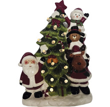 Dekorativní vánoční figurka s Santa Clausem, sněhulákem, medvídkem, sobem a vánočním stromkem s osvětlením.