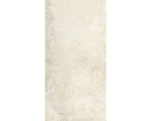 Detail světlé kameninové dlaždice.