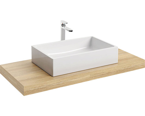 Keramické umyvadlo na desce ze dřeva s vodovodní baterií