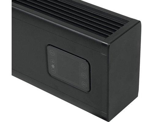 Detailní pohled na černé topidlo s ovládacím panelem