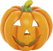 Halloweenská dýně s vyřezávaným obličejem