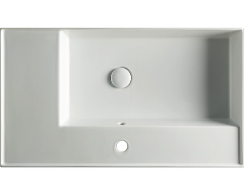 Umyvadlo ze sanitární keramiky s odtokovou soupravou