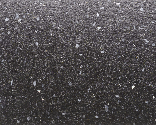 Detailní pohled na strukturovaný povrch se skvrnami