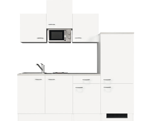 Bílá kuchyňská linka s dřezem, sporákem a mikrovlnnou troubou