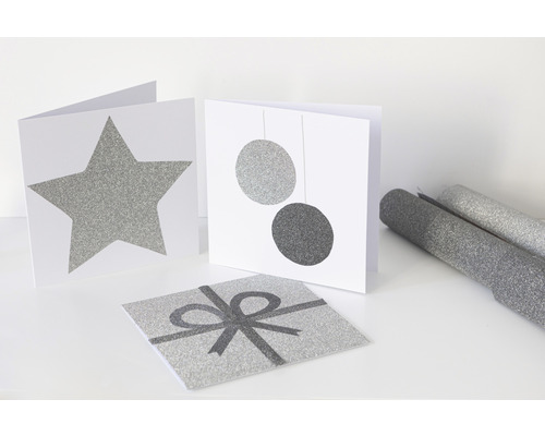 Dekorativní karty s designem hvězdy, koule a dárku a také dekorativní fólie
