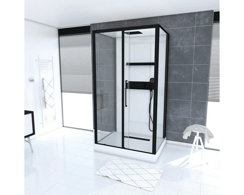 Sprchový kout s černým rámem v světlé koupelně.